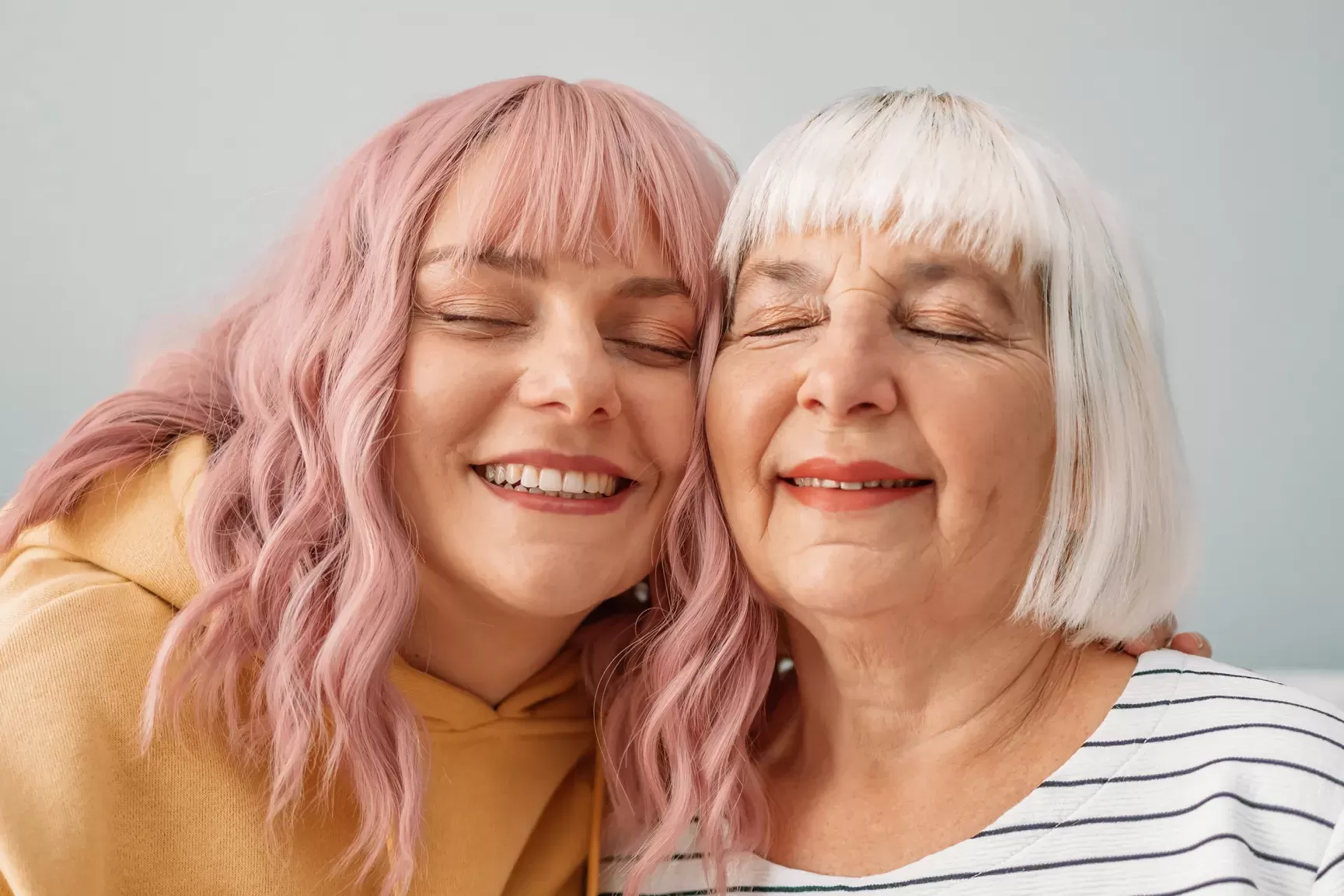 Smiling mother and daughter