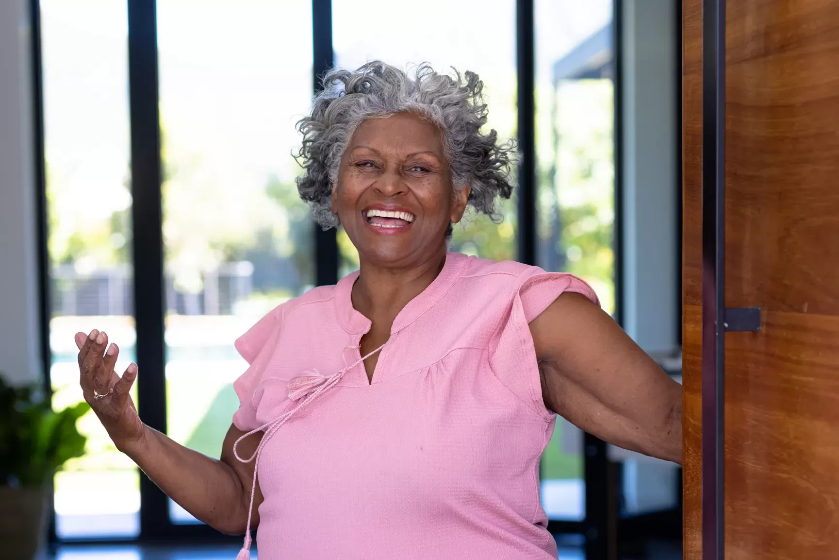 aging at home a senior woman welcoming to her home